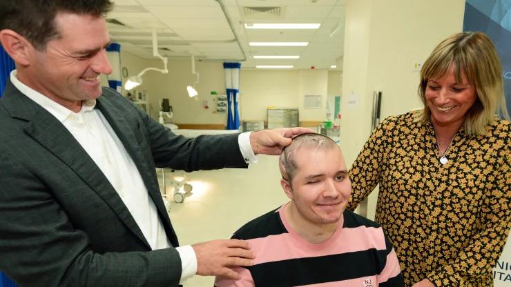 Brisbane man Brodie Ellis is regrowing his own skull, thanks to a world-first operation using a 3D-printed implant at the Princess Alexandra Hospital.